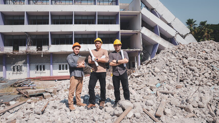 Demolition control supervisor and contractor discussing on demolish building.