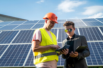 Deal of installation of solar panels between worker and customer