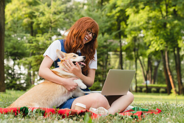 Young student teenager girl woman having video call conversation meeting watching webinar on laptop...
