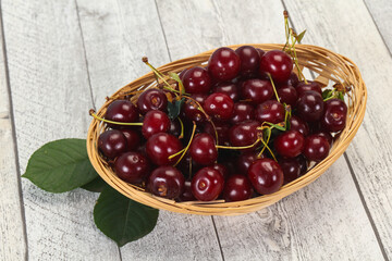 Sweet ripe cherry with leaves