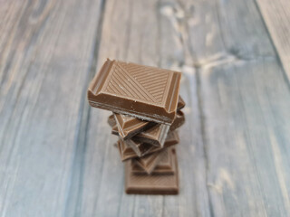 The Chocolate close-up. Pieces of natural chocolate. Milk chocolate.