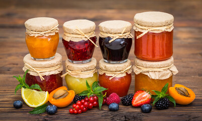 Various homemade fruit jam in the jars
