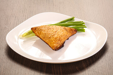 Samosa pie with meat and onion