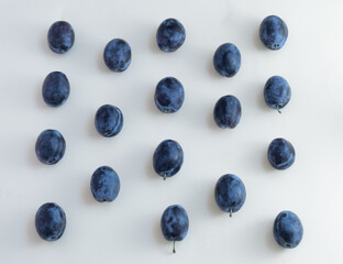 plums on a white background.  autumn concept.flat lay