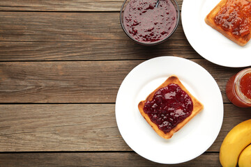 Sweet toasts with jam and fruit for breakfast on grey table, horizontal