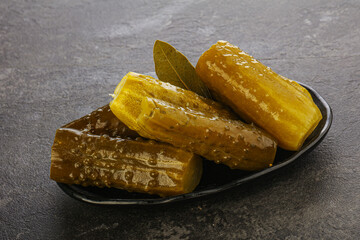 Marinated pickled cucumbers in the bowl