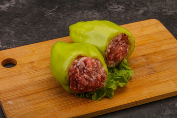 Raw stuffed pepper for cooking