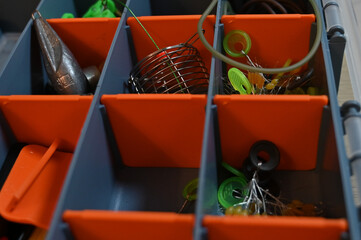 plastic boxes with fishing gear in the open