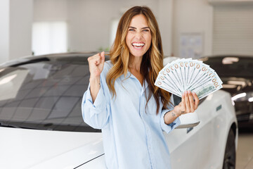 Woman customer buyer client in shirt hold fan cash money dollar banknotes dowinner gesture want to...