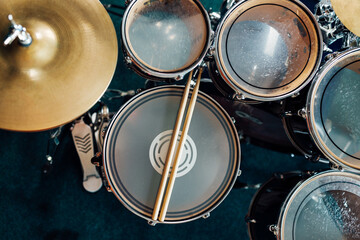 Top view drumsticks on snare drum. Percussion musical instruments.