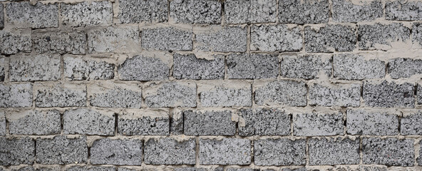 Surface texture of white with gray blurred concrete wall, cement pattern with cracks background with space to copy
