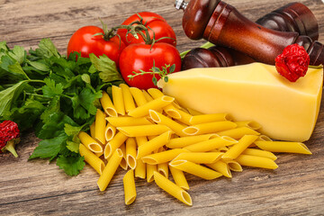 Raw penne rigate for cooking