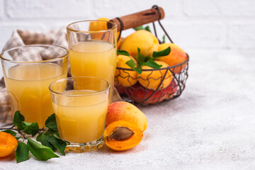 Apricot juice in glass. Healthy drink