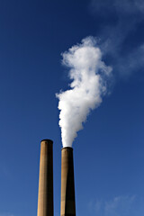 Closeup of smoke coming out of the industrial building
