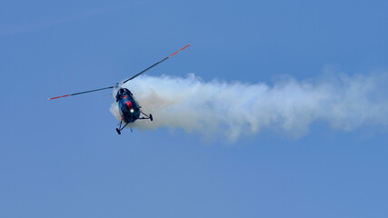 Fototapeta na wymiar Heliforce aerobatic helicopter during the flight show