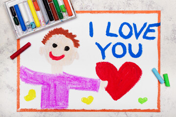 Colorful drawing: A smiling man holds a red heart in his hand. Declaration of love with inscription I LOVE YOU