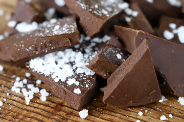 Selective focus. Dark chocolate with sea salt.