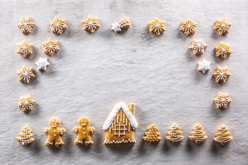 Home-baked gingerbreads arranged in a fairytale Christmas atmosphere.