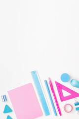 Flat lay school and office supplies on a white background