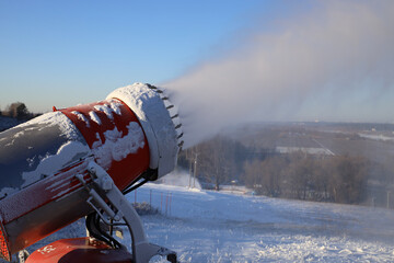 Snow cannon in action at ski resort. Snow Gun at work.