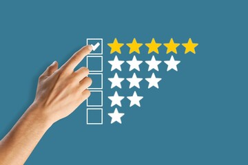 Hand touching and doing mark to five stars, the best customer satisfaction