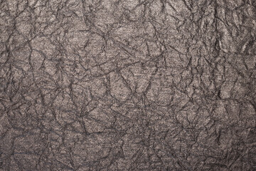 Luxury crinkled, shiny texture; sparkle paper textured background