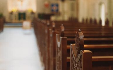The interior of the church with benches.