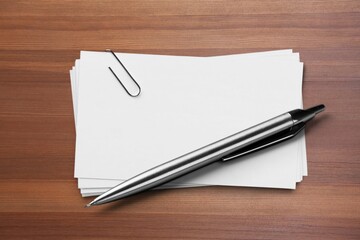 Office pen, blank notebook on the desk