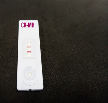 Rapid test device or cassette for CK-MB test, showing positive result. Rapid screening test, myocardial infraction