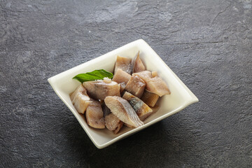 Sliced herring fillet in the bowl