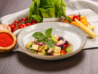 Traditional Greek salad with feta and vegetables