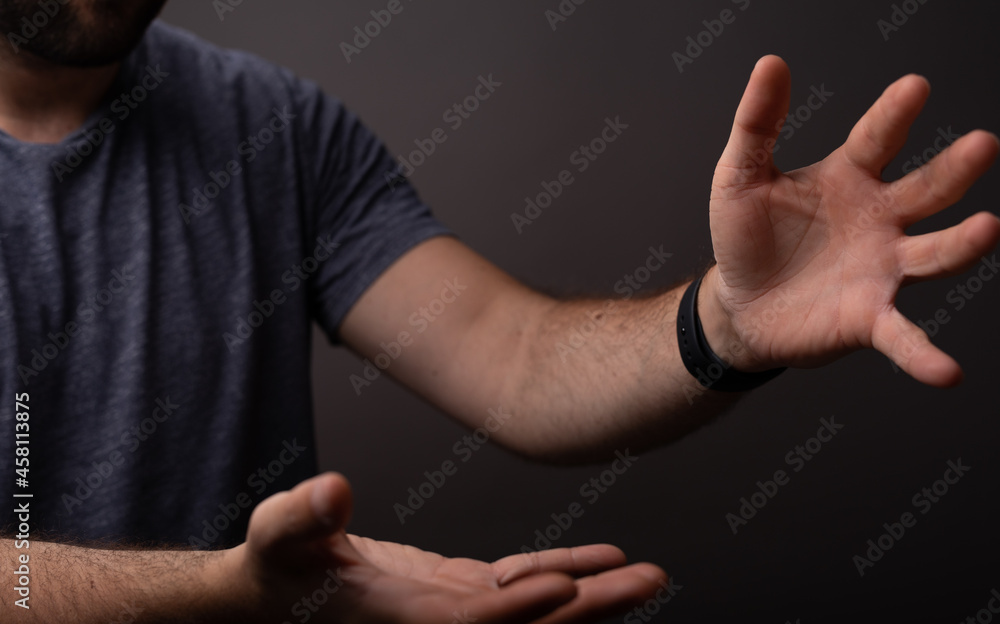 Poster man showing his empty hand.