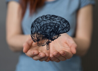 Creative background, the human brain on a blue background, the hemisphere