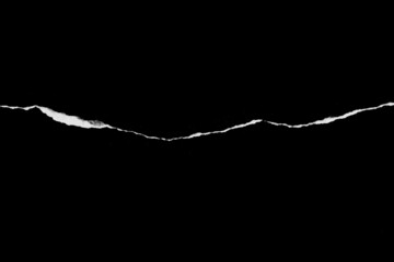 Paper tear, ripped paper edge, torn edge, isolated paper tear white on black, paper corner with space for copy