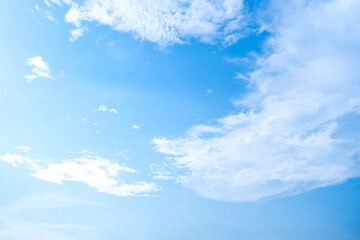 bright clear blue sky with soft fluffy white clouds. like heaven. good atmosphere. fresh air. 