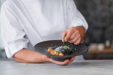 Chef hands cooking Italian pasta and cheese