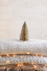 Christmas little trees and golden lights bokeh.