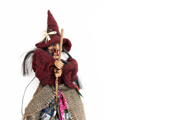 Halloween. Old Baba Yaga on a broomstick on a white background.