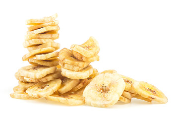 Dried banana slices isolated on a white background. Pile of banana chips.