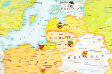 Close-up view of Baltic States on a geographical globe, Map shows capitals countries Latvia -Riga, Lithuania - Vilnus, Estonia -Tallin Poland -Krakow and Kaliningrad region of Russia and their flags