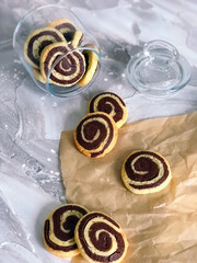 Shortbread chocolate cookies in the shape of a spiral.