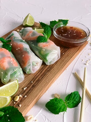 Spring roll with seafood and vegetables in rice paper.