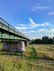 Railway bridge crossing Sava river on the outskirts of Zagreb city at sunset