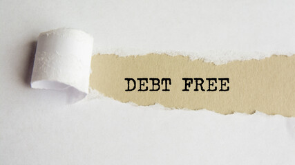 debt free. words. text on gray paper on torn paper background