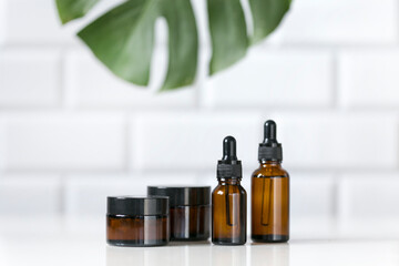cosmetic containers for skin care on a white table background. Organic spa beauty products
