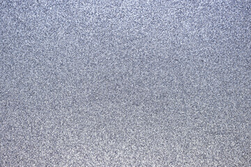 Glittering sparkle background texture; luxury, festive, holiday, shiny texture paper