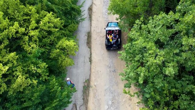 Dzhur-Dzhur waterfall in Crimea offroad jeep waterfall waterfall amazing crimea, tourism aerial  stream aragliding flight, flyover. Flowing natural ngle , djur wild park.