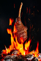Torreo beef steak is fried on the fire.