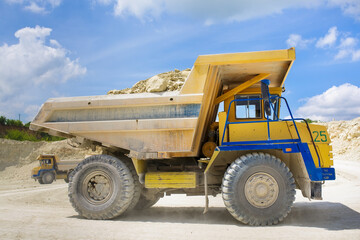 Obraz premium A large quarry dump truck loaded with rock.