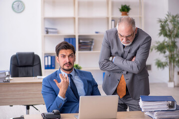 Two colleagues working in the office